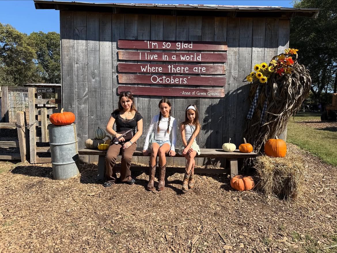 The three Lowe sisters at a pumpkin patch